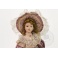Bambola di porcellana con abito ottocentesco